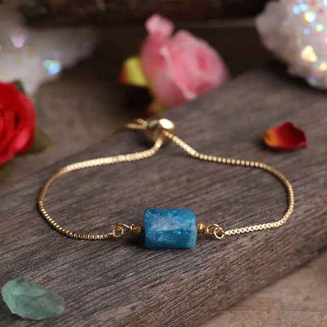 Bracelet ajustable en chaîne dorée avec pierres prismatiques