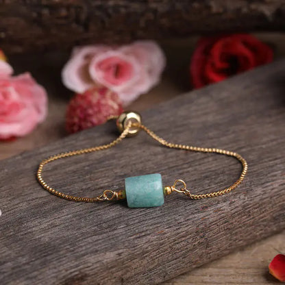 Bracelet ajustable en chaîne dorée avec pierres prismatiques