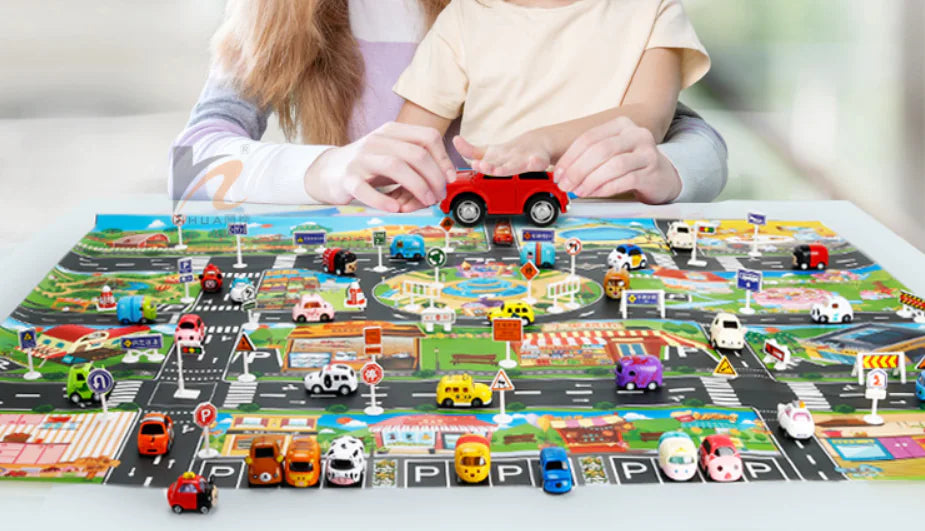 Tapis de jeu avec véhicules et panneaux de signalisation