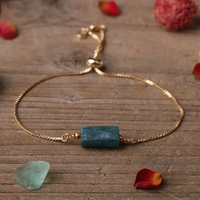 Bracelet ajustable en chaîne dorée avec pierres prismatiques